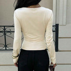 French-style Niche Off-white Top For Women Irregularly Crossed Pleated Design On The Front Chest Long Sleeves Loose Fit And Figure-flattering