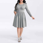 Mid-length Knitted Dress With Pockets On Both Sides